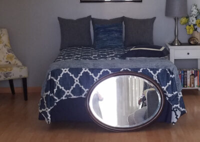 Bed and mirror