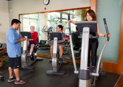 A group of people working out in a gym.