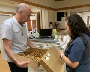 Bob Beitcher presents cookies for Nurses Week